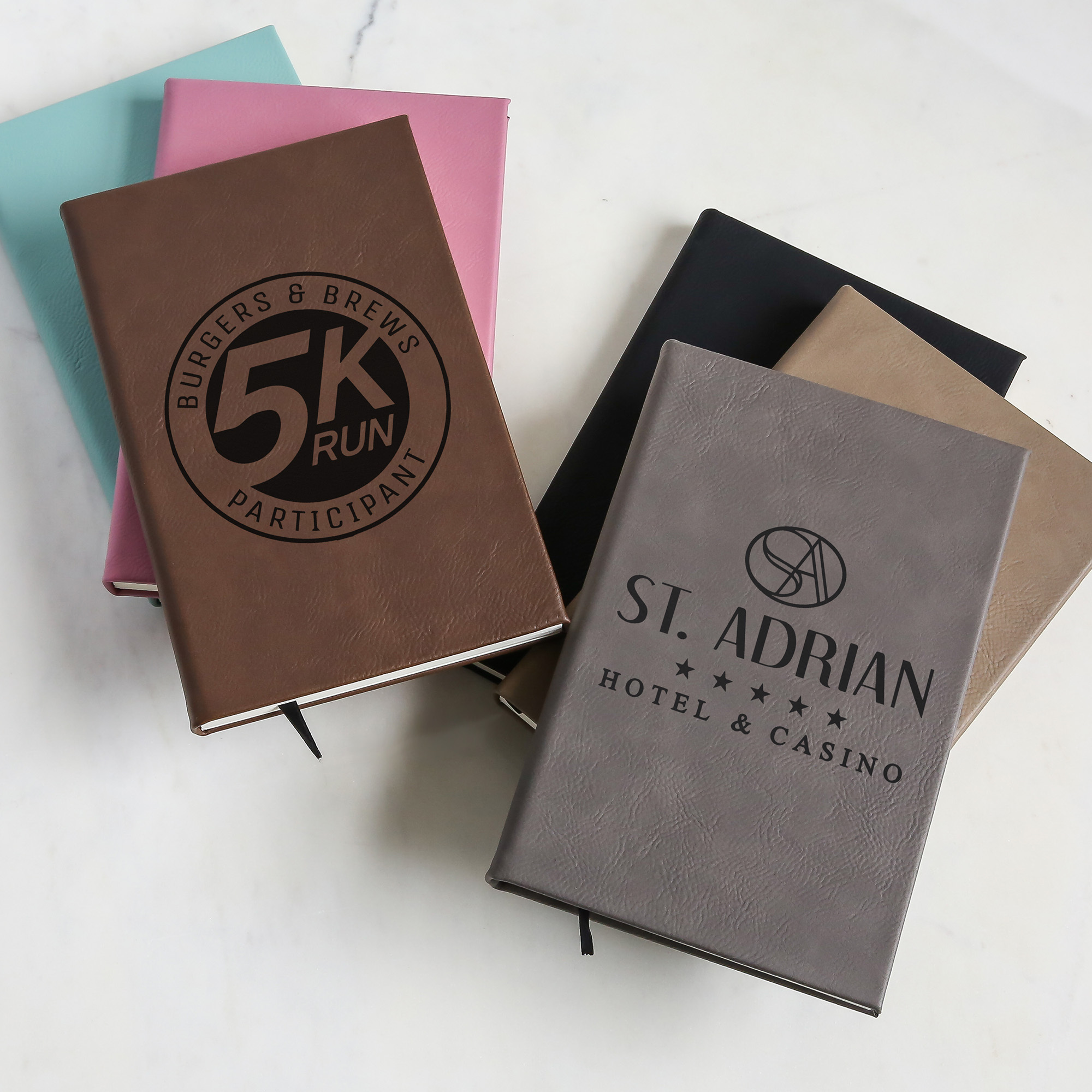 Bulk custom engraved journals with logo for onboarding and conferences