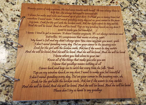 Custom engraved album with song lyrics