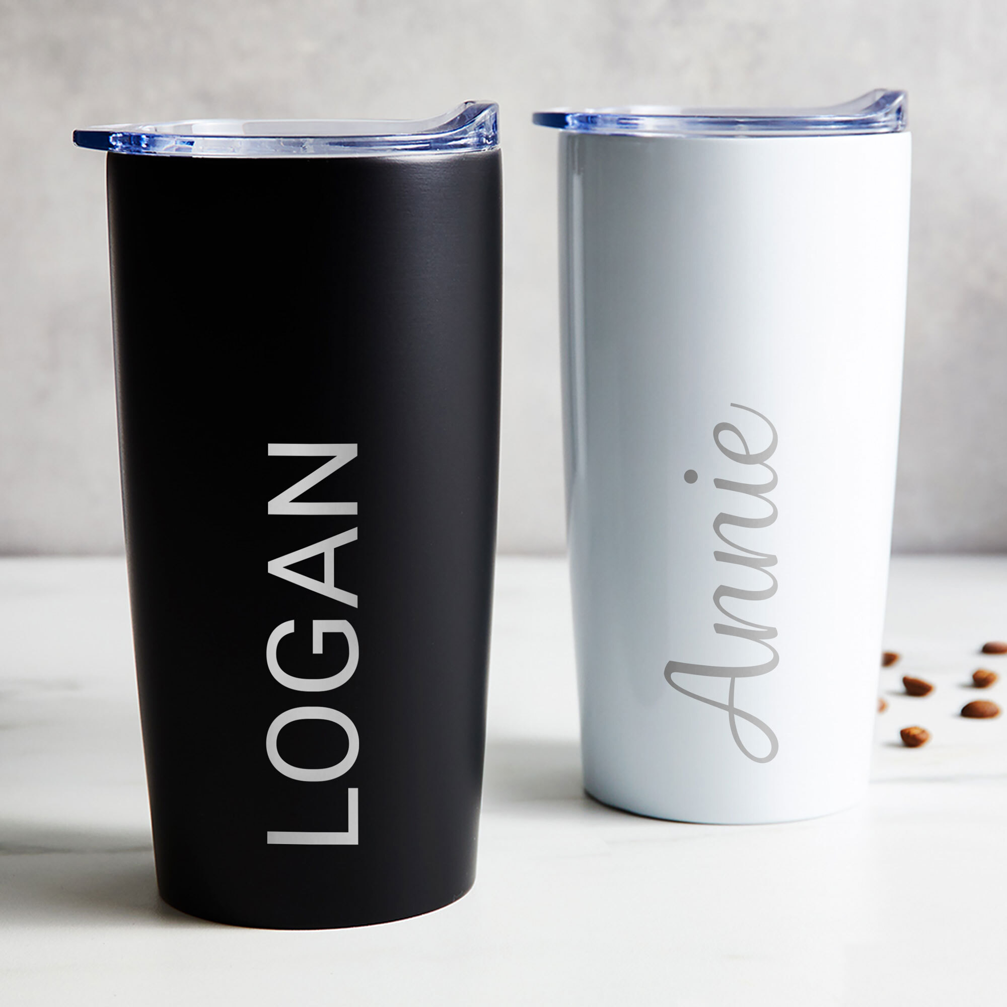 Laser engraved stainless steel travel tumbler personalized with employee name